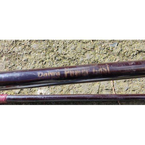 376 - A Daiwa Power Cast fishing rod.