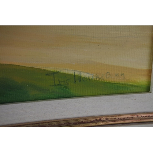 604 - A framed painting of White Park Bay, signed by the Artist.  Approx 50x39cm.