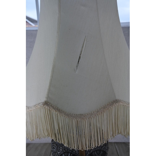 610 - A large pottery based table lamp and shade.  Approx 70cm.