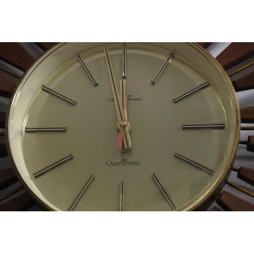 626 - A stunning vintage Seth Thomas Quartzmatic sundial wall clock.  Approx 84cm.