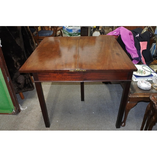 629 - An antique mahogany gate leg turn over table.  Approx 92x76x92cm.