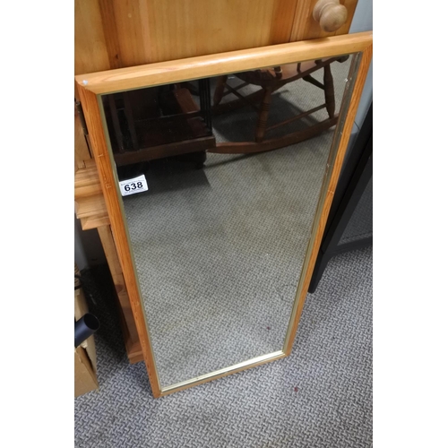 638 - A pine framed wall mirror.  Approx 39x92cm.