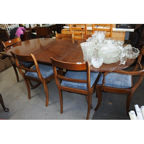 654 - A mahogany dining room table and six chair set.   Table approx 90x195x75cm.