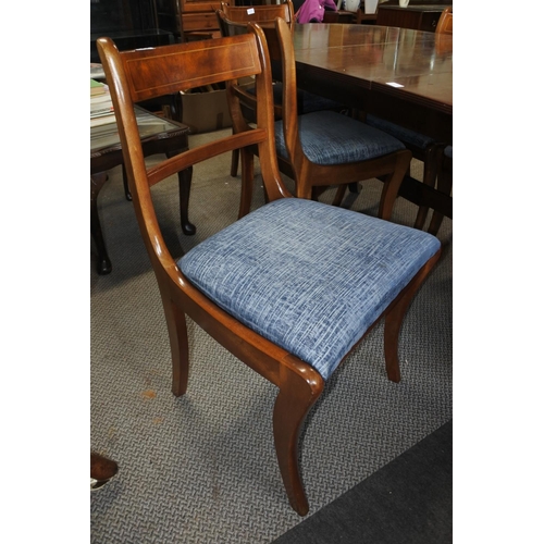 654 - A mahogany dining room table and six chair set.   Table approx 90x195x75cm.