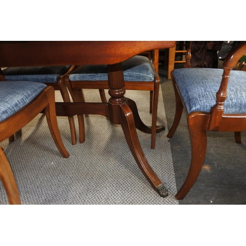 654 - A mahogany dining room table and six chair set.   Table approx 90x195x75cm.