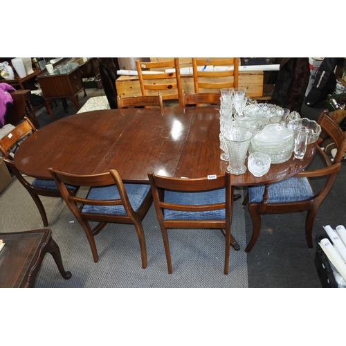 654 - A mahogany dining room table and six chair set.   Table approx 90x195x75cm.