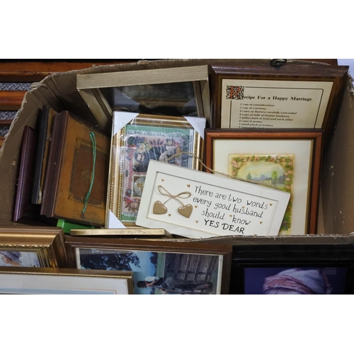 659 - A box of assorted pictures and prints.