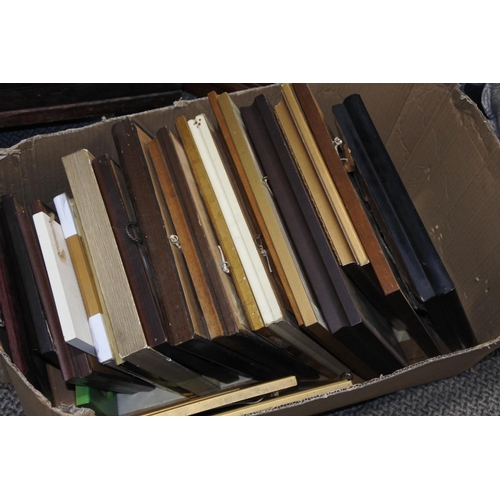 659 - A box of assorted pictures and prints.