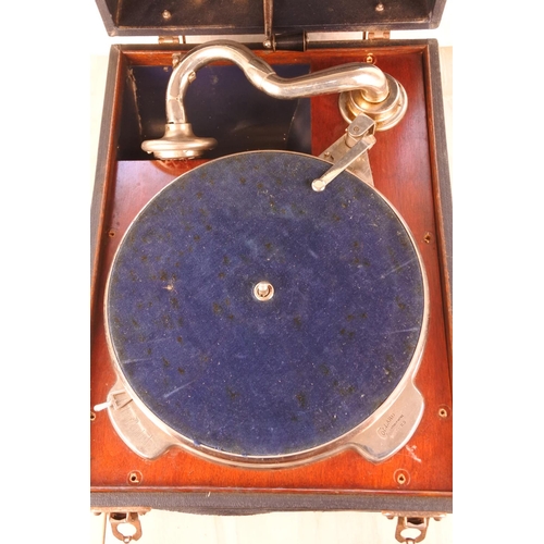 667 - A vintage Collaro motors 'Meritone' cased gramophone.