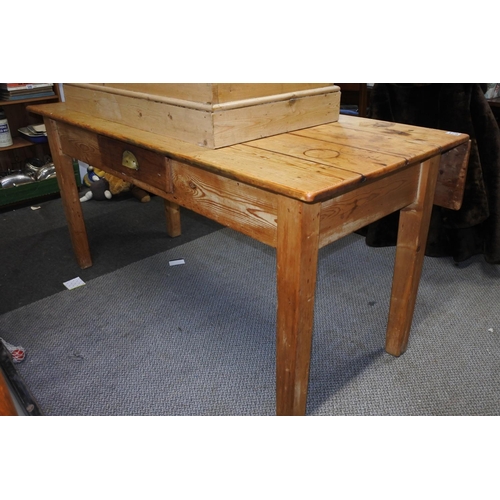 671 - A stunning antique pine drop leaf dining table.  Approx 153x76x90cm.