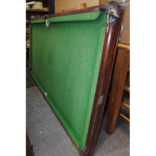 673 - A vintage pool table.  Approx 95x190cm.