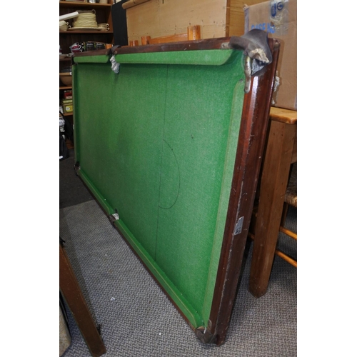 673 - A vintage pool table.  Approx 95x190cm.