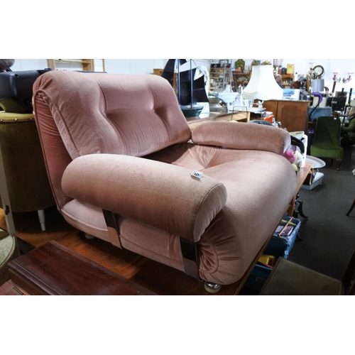 686 - A vintage upholstered lounge chair.