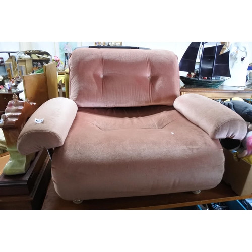 686 - A vintage upholstered lounge chair.