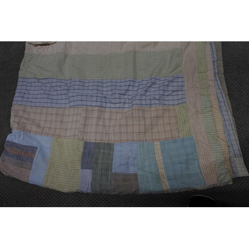 687 - A vintage Irish patchwork blanket.