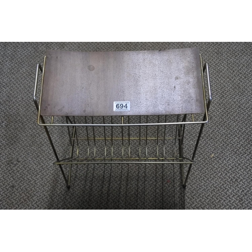 694 - A vintage metal framed magazine rack/table.