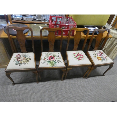 705 - A stunning set of four mahogany framed chairs with tapestry upholstered seats.