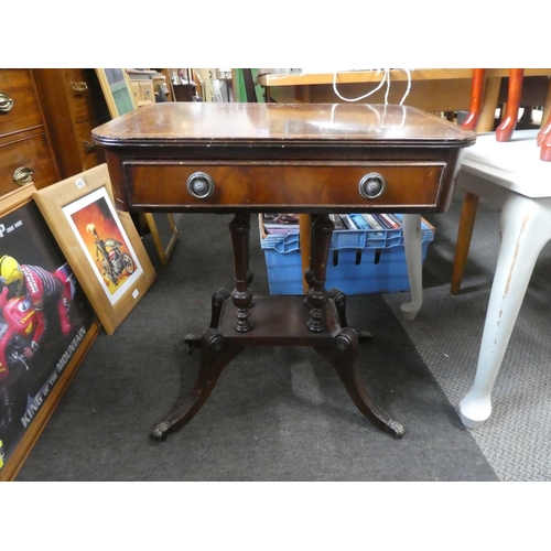 723 - A small mahogany table (missing a caster).  Approx 59x57x40cm.