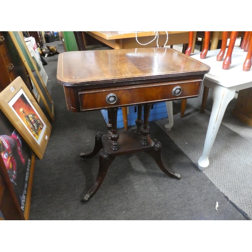 723 - A small mahogany table (missing a caster).  Approx 59x57x40cm.