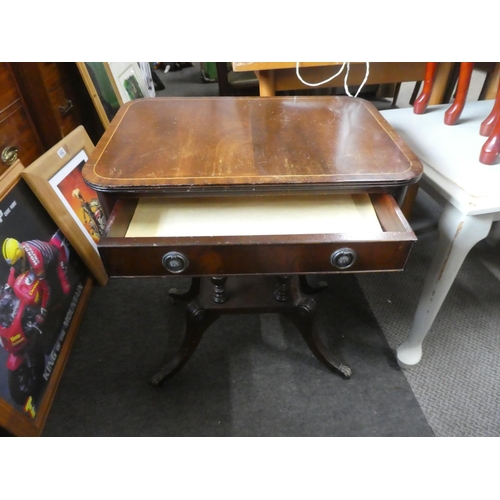 723 - A small mahogany table (missing a caster).  Approx 59x57x40cm.