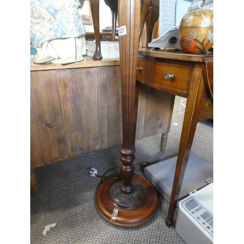 727 - A mahogany standard lamp and shade.  Approx 167cm.