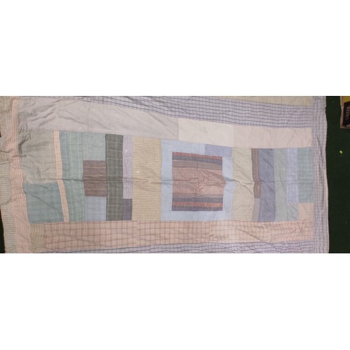 687 - A vintage Irish patchwork blanket.