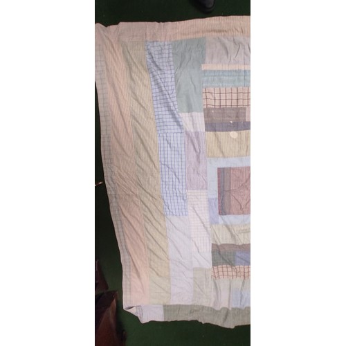 687 - A vintage Irish patchwork blanket.