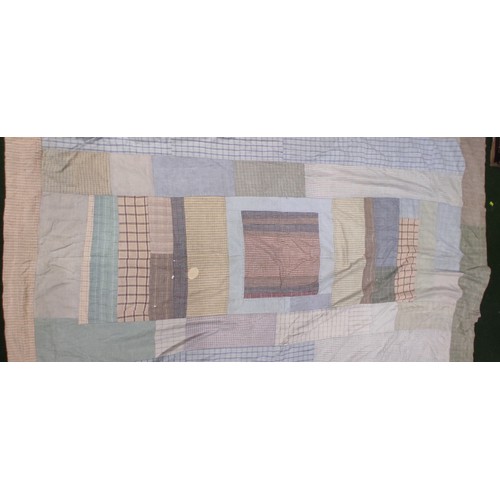 687 - A vintage Irish patchwork blanket.