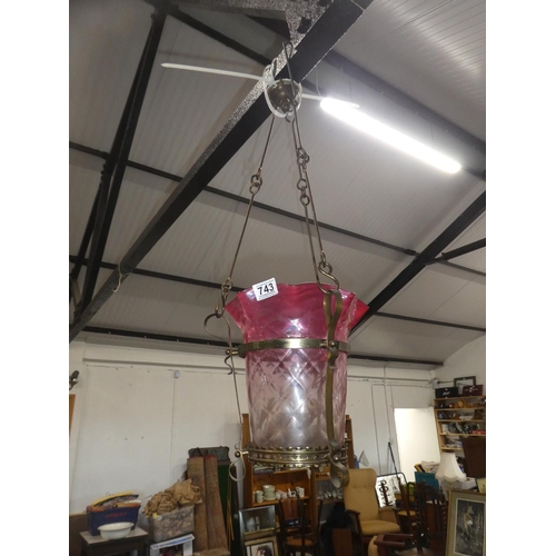 743 - A stunning antique ruby glass shade pendant light on  brass bracket.