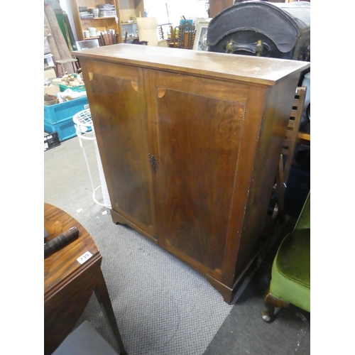 748 - A stunning antique mahogany two door cupboard with inlay detail and adjustable shelves.   Approx 102... 