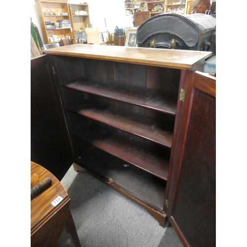 748 - A stunning antique mahogany two door cupboard with inlay detail and adjustable shelves.   Approx 102... 