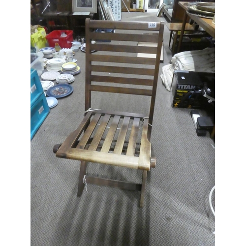 750 - A wooden folding garden chair.