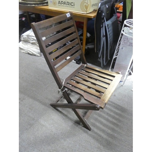 750 - A wooden folding garden chair.