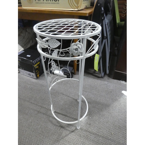 752 - A metal plantstand.  Approx 75cm.