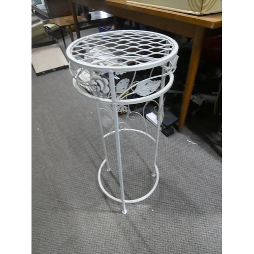 752 - A metal plantstand.  Approx 75cm.