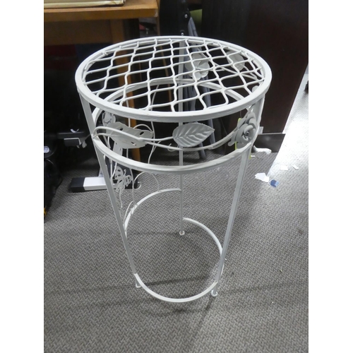 752 - A metal plantstand.  Approx 75cm.