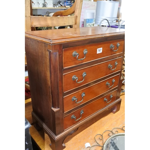 767 - A stunning small chest of four drawers.  Approx 58x59x27cm.