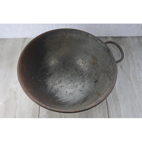 768 - A large handled bowl.