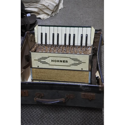 769 - A vintage Hohner Student 1 accordion and case.