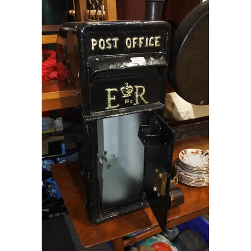 773 - An antique style post box with key.  Approx 25x60x36cm.