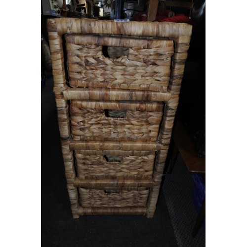 775 - A rattan four drawer storage unit.  Approx 37x80x30cm.