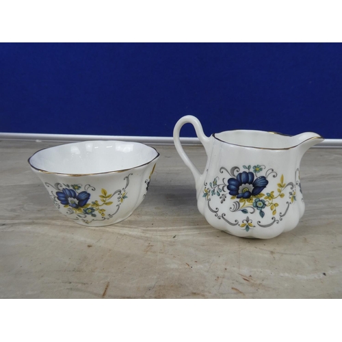 223 - A Royal Tara bone china 'Tara Hall' milk jug and sugar bowl.