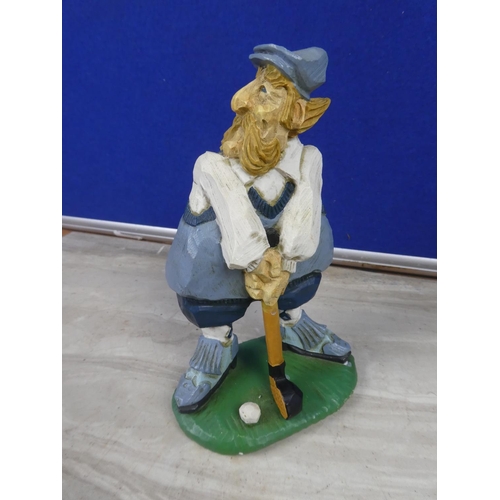 227 - A David Frykman figure of a golfer.