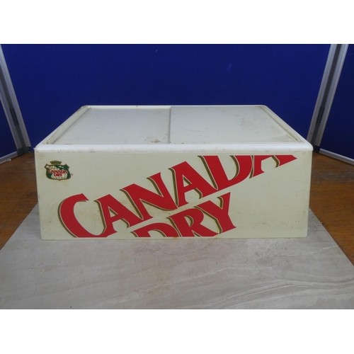 303 - A large vintage counter top Canada Dry ice box.