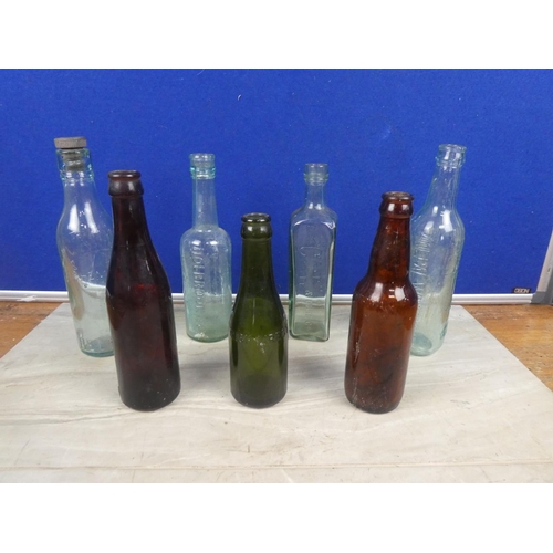 307 - A collection of vintage beer bottles to include P Murphy, Ballymena, Quinn Brothers, Cookstown, Iris... 