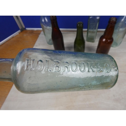 307 - A collection of vintage beer bottles to include P Murphy, Ballymena, Quinn Brothers, Cookstown, Iris... 