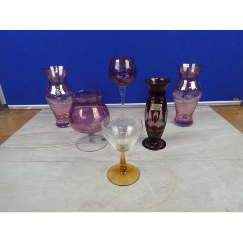 310 - A collection of coloured etched glasses and vase.