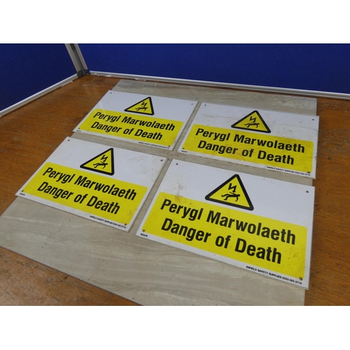 315 - Four plastic 'Danger of Death' signs.