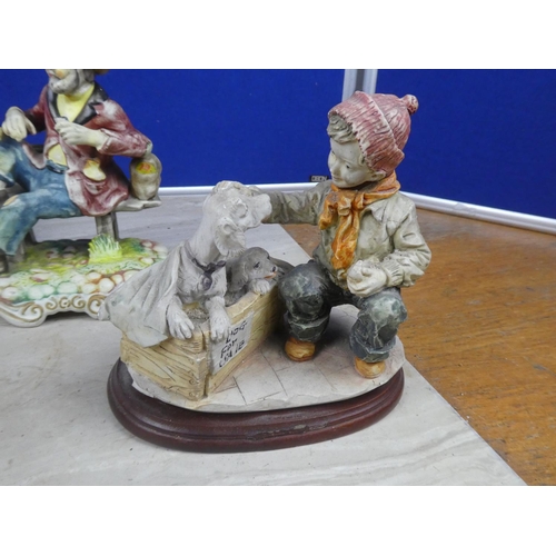 355 - Three Capodimonte figurine style ornaments and another.