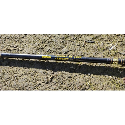 377 - A Daiwa Trident de Lux fishing rod.